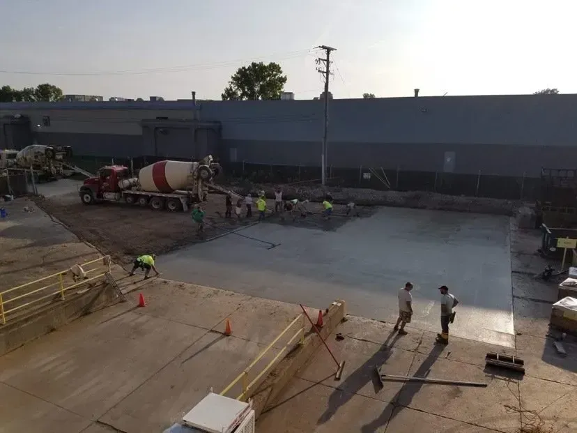 Mike Kelley and the Kelley Concrete and Construction crew pouring a commercial slab