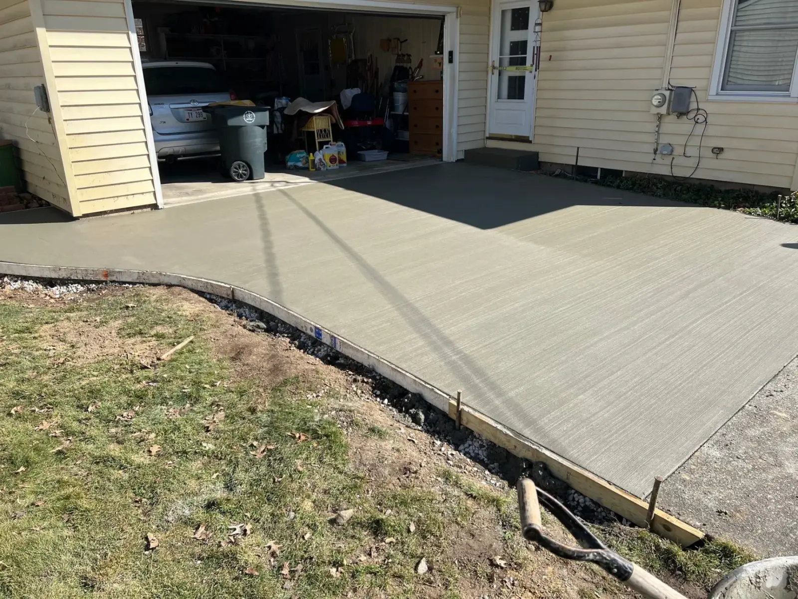Broom-finished concrete driveway